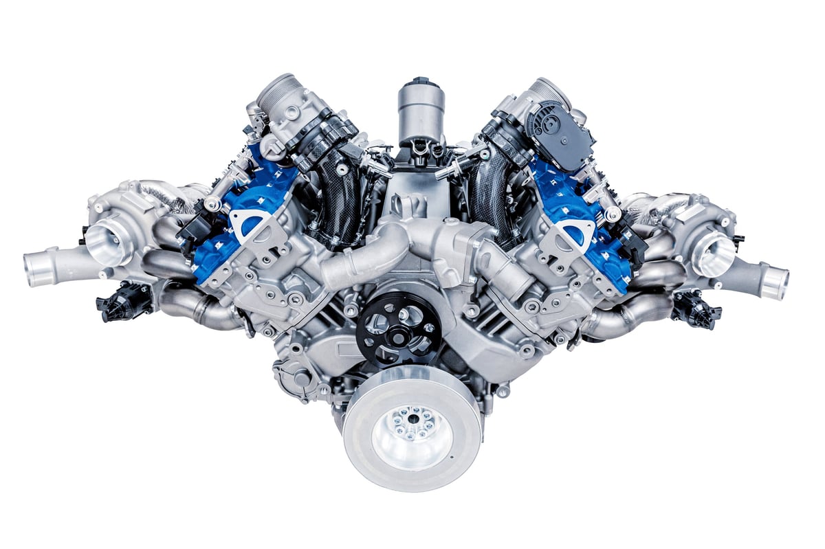 Powerful V8 engine with twin turbochargers, displaying detailed mechanical engineering and automotive technology